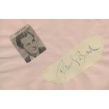 Derek Bond signed autograph page include a small black & white cut out picture. was a British actor.