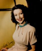 Loretta Young signed 10x8 inch colour photo. Good condition. All autographs come with a