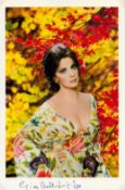 Gina Lollobrigida signed 10.5x7 inch colour photo. Good condition. All autographs come with a