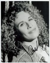 Carole King signed 10x8 inch black and white photo. Good condition. All autographs come with a