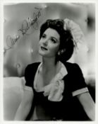 Ann Rutherford signed 10x8 inch black and white photo. Good condition. All autographs come with a