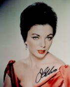 Joan Collins signed 10x8 inch colour photo. Good condition. All autographs come with a Certificate