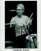 Charlie Watts signed 10x8 inch black and white promo photo. Good condition. All autographs come with