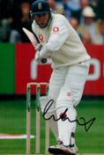 Mike Atherton signed 12x8 inch colour photo pictured while playing for England in test match