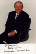 Michael Parkinson signed colour promo photo. DEDICATED. Good condition. All autographs come with a