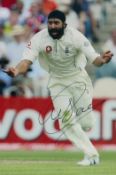 Monty Panesar signed 12x8 inch colour photo pictured while playing test match cricket for England.