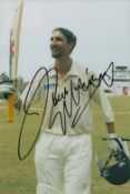 Jason Gillespie signed 12x8 inch colour photo pictured while playing test match for Australia.