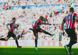 Jermaine Defoe signed 12x8 inch colour photo pictured in action for Sunderland. Good condition.