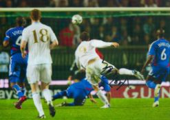 James McFadden signed 12x8 inch colour photo pictured while scoring for Scotland against France.