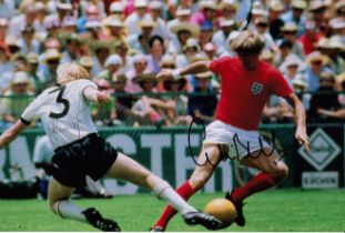 Football autograph ENGLAND v WEST GERMANY 12 x 8 Photo : Col, depicting England's COLIN BELL evading