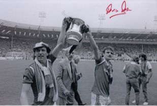 Football autograph KEVIN MORAN 12 x 8 Photo : B/W, depicting Manchester United's John Gidman and