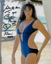 James Bond Caroline Munro signed 10 x 8 inch colour sexy blue swim suite photo, inscribed Naomi 007.