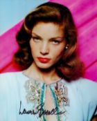 Lauren Bacall signed 10x8 inch colour photo. Good condition. All autographs come with a