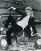 Joanna Lumley signed 10x8inch black and white photo. Good condition. All autographs come with a