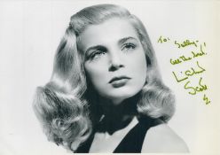 Lizabeth Scott signed 10x8 inch black and white photo dedicated. Good condition. All autographs come