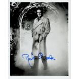 Robert Stack signed 10x8 inch black and white photo. Good condition. All autographs come with a