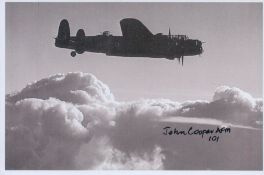 WW2 F/O John Cooper AFM 101 sqn signed 6 x 4 inch Lancaster in flight picture. Bomber Command