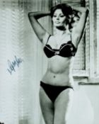Sophia Loren signed 10x8 inch black and white photo. Good condition. All autographs come with a