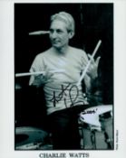 Charlie Watts signed 10x8 inch black and white photo. Good condition. All autographs come with a