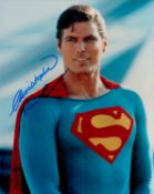 Christopher Reeve signed 10x8 inch Superman colour photo. Good condition. All autographs come with a