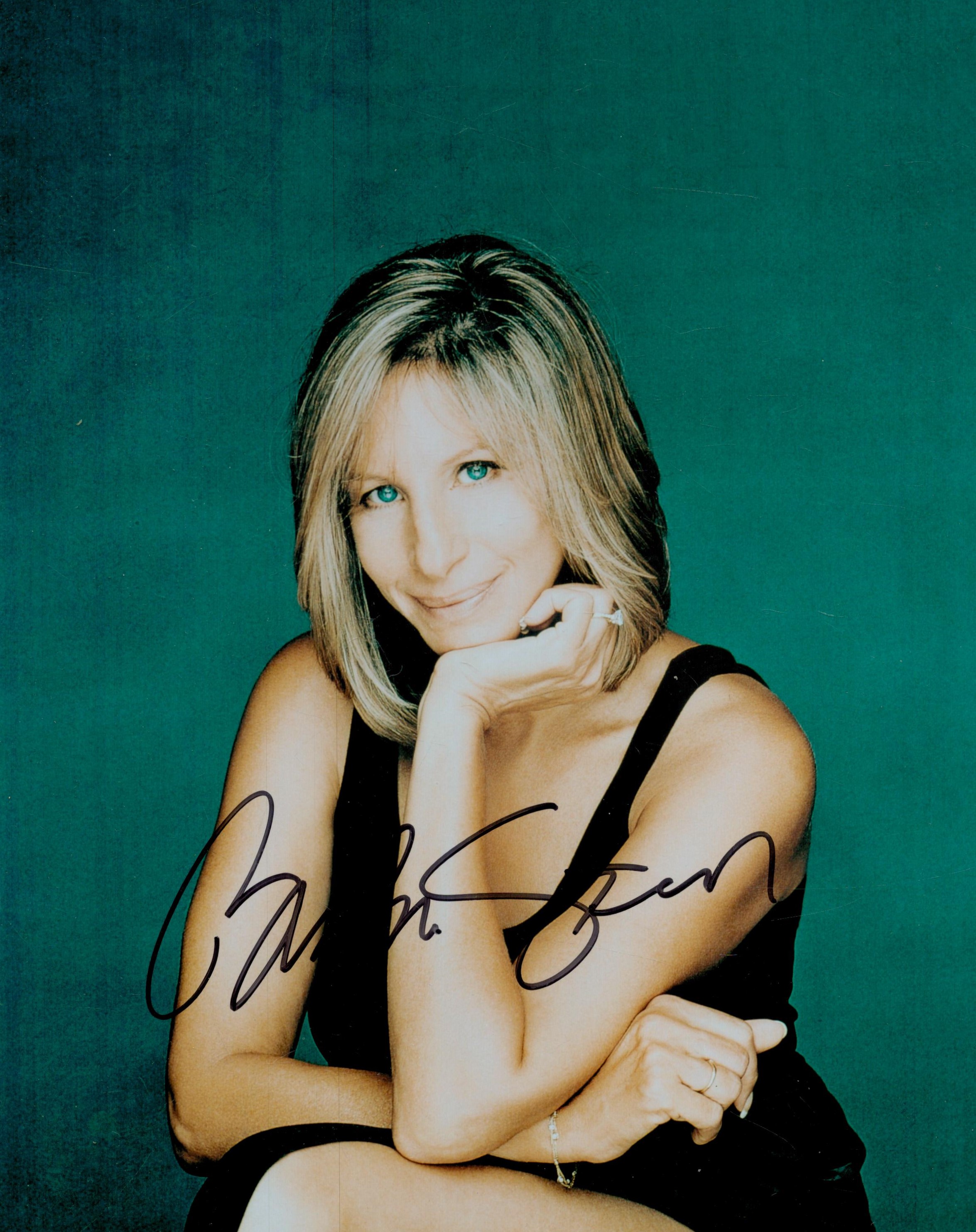 Barbara Streisand signed 10x8 inch colour photo. Good condition. All autographs come with a
