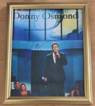 Donny Osmond signed 11x9 inch overall framed colour photo. Good condition. All autographs come