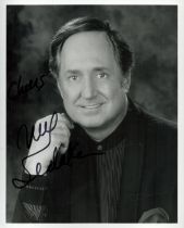 Neil Sedaka signed 10x8 inch black and white photo. Good condition. All autographs come with a