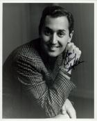 Neil Sedaka signed 10x8 inch vintage black and white photo. Good condition. All autographs come with