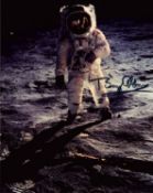 Buzz Aldrin signed 10x8 inch colour photo pictured walking on the moon. Good condition. All