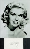 Doris Day signed 5x3 inch white card and 10x8 inch vintage black and white photo. Good condition.