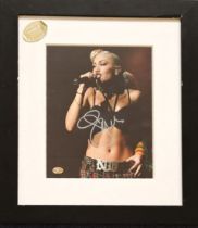 Signed Framed colour Photo of Gwen Stefani Autograph is written in pen. Measures appx 22x14 inch