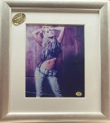 Signed Framed colour Photo of Christina Aguilera Autograph is written in pen on the bottom right