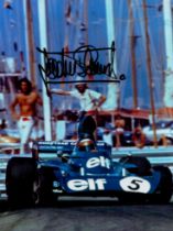 Jackie Stewart signed 7x5 inch colour photo. Good condition. All autographs come with a