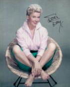 Doris Day signed 10x8 inch colour photo. Good condition. All autographs come with a Certificate of