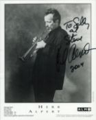 Herb Albert signed 10x8 inch black and white promo photo dedicated. Good condition. All autographs