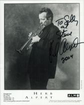 Herb Albert signed 10x8 inch black and white promo photo dedicated. Good condition. All autographs