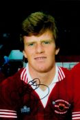 Andy Ritchie signed 12x8 inch colour photo pictured during his time with Manchester United. Good