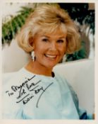 Doris Day signed 10x8 inch colour photo. Good condition. All autographs come with a Certificate of