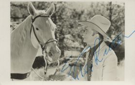 Tex Ritter, a signed 5.5x3.5 photo. He was a pioneer of American country music, a popular singer and