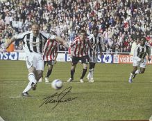 Alan Shearer signed 20x16 inch colour photo pictured scoring for Newcastle United against