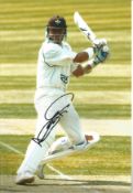 Alec Stewart signed 12x8 inch colour photo pictured in action for Surrey C.C.C. Good condition.