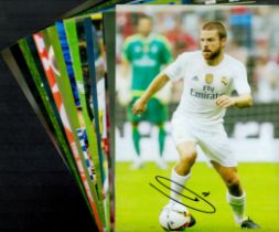 Football signed collection. Contains 17 colour 12x8inch photos. Some of signatures include Alvaro
