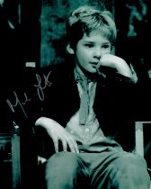 Mark Lester signed 10x8 inch black and white Oliver photo. Good Condition. All autographs come