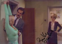 Prunella Scales signed 7x5 inch Fawlty Towers colour photo. Good Condition. All autographs come with