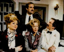 Prunella Scales signed 10x8 inch Fawlty Towers colour photo. Good Condition. All autographs come