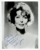 Loretta Young signed 10x8 inch black and white photo. Good condition. All autographs come with a