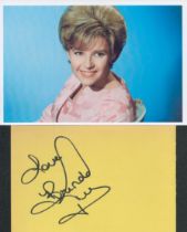 Brenda Lee signed 6x4inch yellow card with UNSIGNED 6X4inch colour photo. Good condition. All