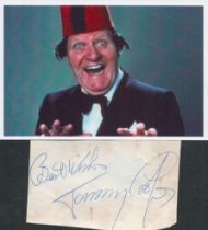 Tommy Cooper signature piece along with unsigned 6x4inch colour photo. Some marks to signature