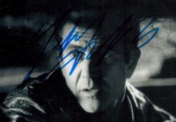 Mel Gibson, actor. A signed 5x3.5 inch photo, a scene from the film Conspiracy Theory, a 1997