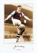 Jimmy Mcllroy 16x12 Limited Editon coloured signed photo. Pictured in his Burnley FC kit balancing